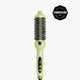 A light green and black round hairbrush styling tool with a digital temperature display, shown on a light gray background with a black Cosmopolitan Beauty Award badge in the top right corner.