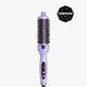 A lavender purple hot air brush with a digital display and three buttons, shown against a light gray background with a black Cosmopolitan Beauty Awards badge in the top right corner.