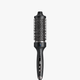 Black Blowout Boost Grande with bristle head and cylindrical design on a white background