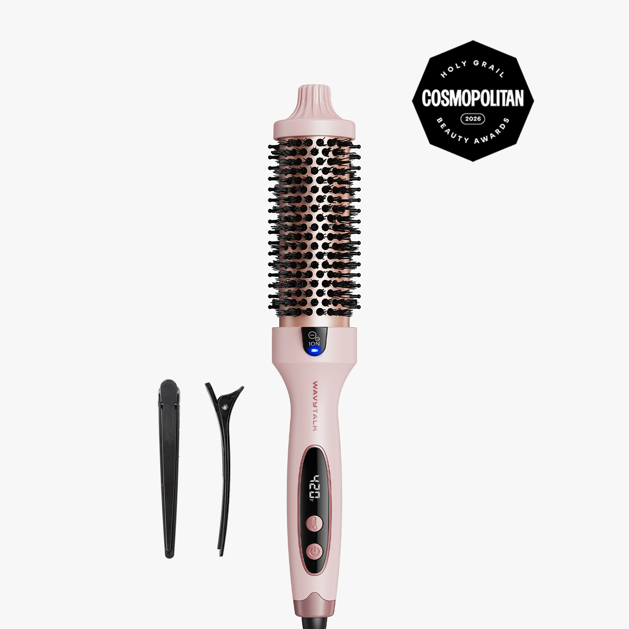 Woman with red hair holding a hair styling tool against a white background