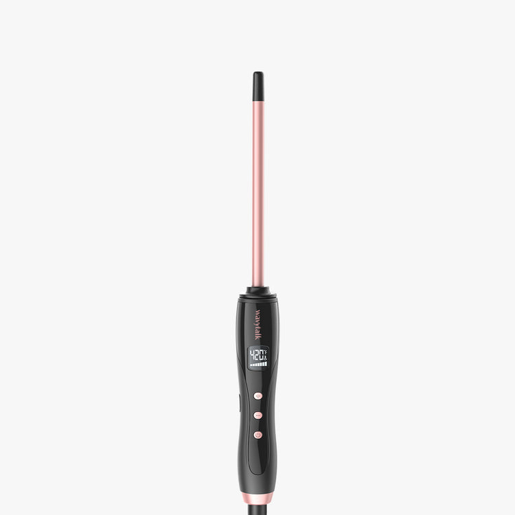 A rose gold Micro Wave hair curler with a digital temperature readout.