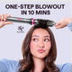 Woman using a grey Blowout Boost hair styling tool with text 'One-Step Blowout in 10 Mins' on a light purple background.