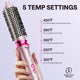 Pink Heatwave Pro 1.5 inch hair styling tool with temperature settings on a light purple background