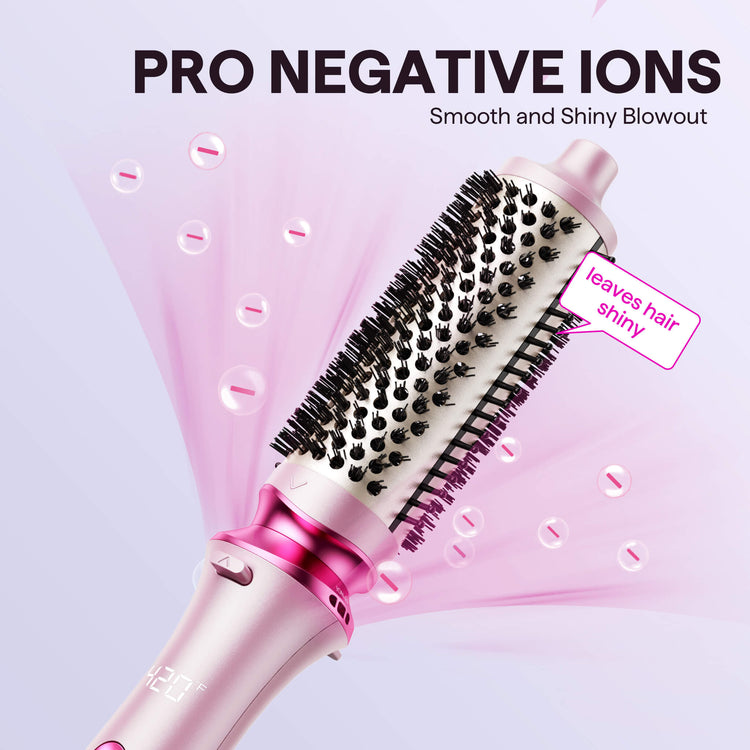 Pink Pink Heatwave Pro hair styling tool with black bristles on a light pink background, labeled 'PRO NEGATIVE IONS' and 'Smooth and Shiny Blowout'.