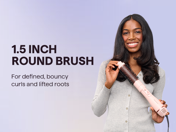 1.5 inch round brush styling tool for defined, bouncy curls and lifted roots, held by a woman with voluminous styled hair.