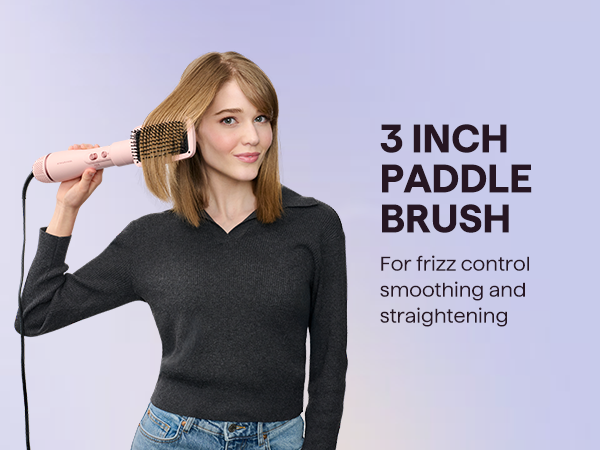 Woman holding a 3-inch paddle brush with text on a light purple background