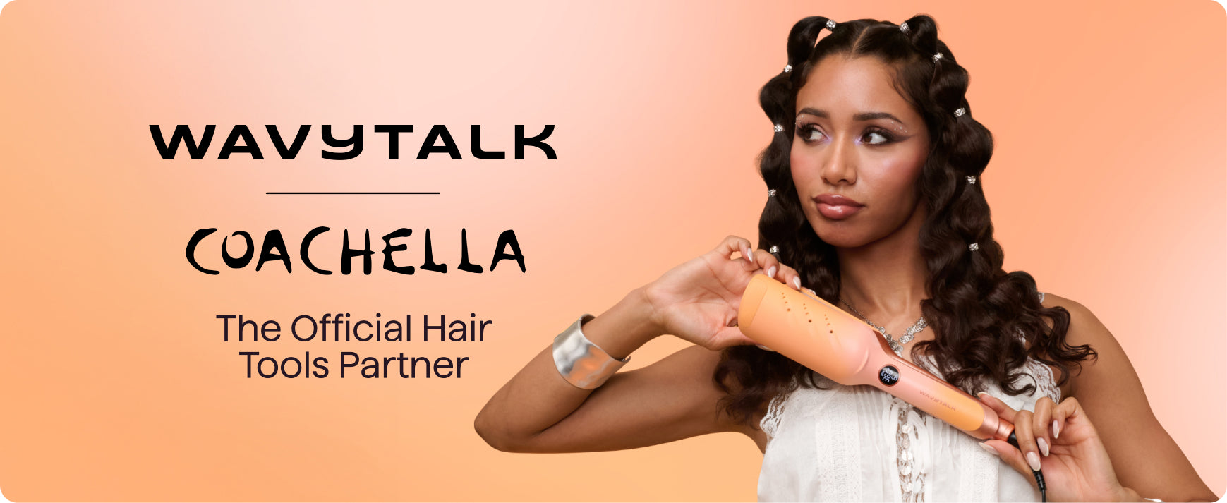 Woman holding a hair tool with 'Wavytalk' and 'Coachella' branding on a peach background