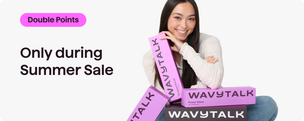 A woman sitting on a light gray background holding several pink and purple WAVYTALK promotional boxes. Text on the left reads 'Double Points' and 'Only during Summer Sale'.