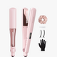 Pink hair straightener with accessories on a white background