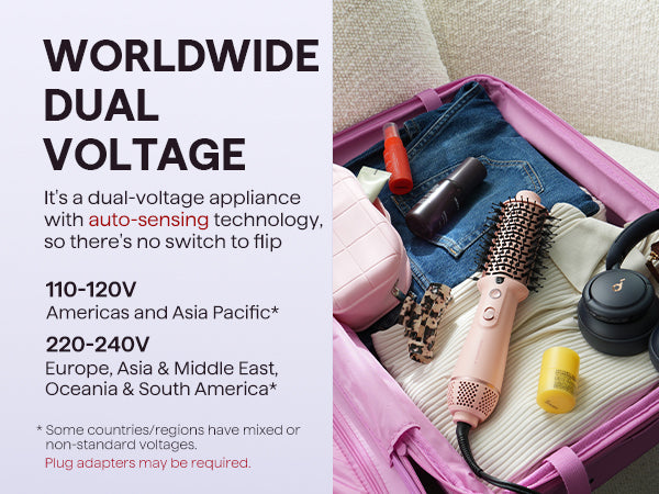 Jet brush in a suitcase with dual voltage appliance information on the side.