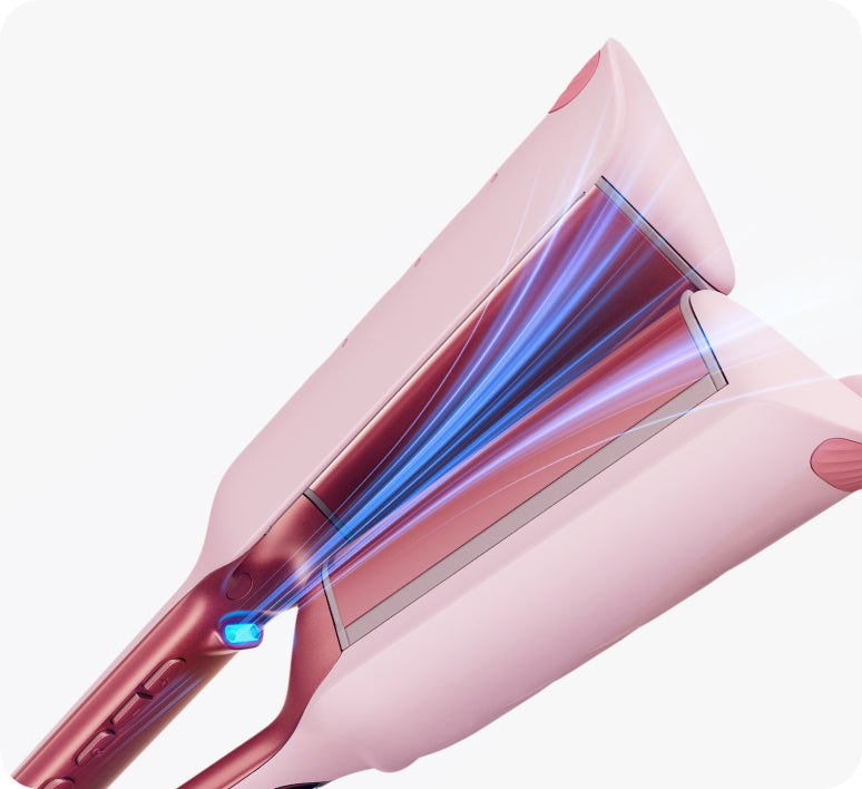 Pink hair dryer with blue light on a white background